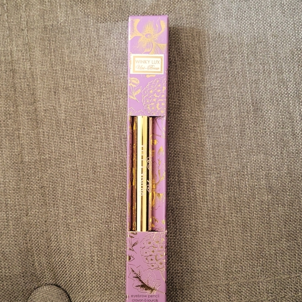 Winky Lux Uni-brow